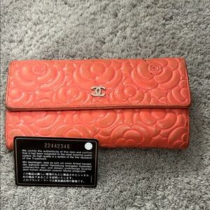 CHANEL Pink Floral Embossed Wallet